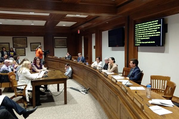 Human service workers testify at the Massachusetts State House in favor of student loan assistance.